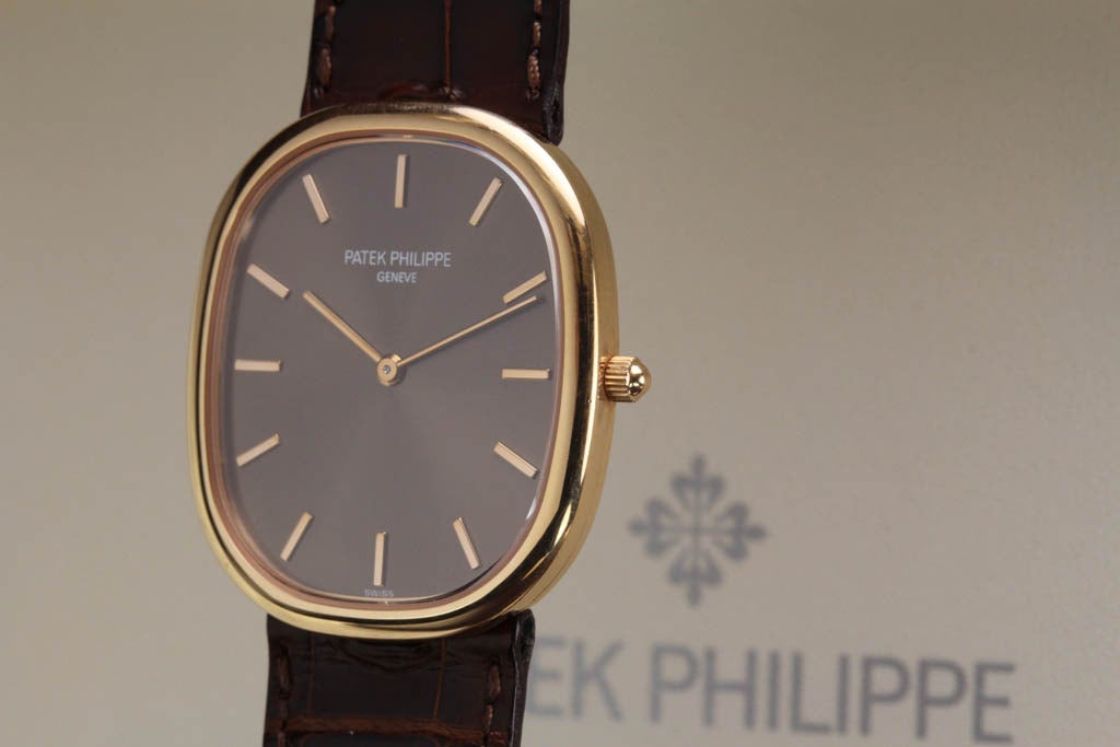 This is a Patek Philippe Philippe Golden Ellipse in 18k Rose Gold. It features an automatic movement and beautiful brown dial. It is in excellent condition with original box and papers.