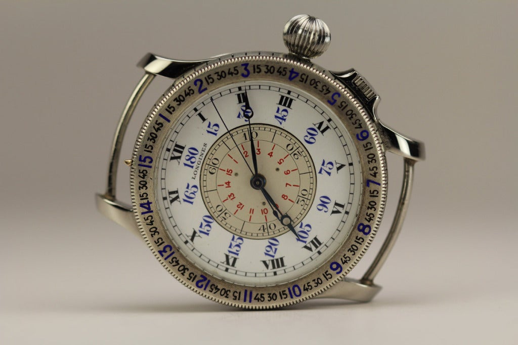 This is an original Longines Lindbergh Hour Angle aviator's wristwatch from the 1940s. This model was designed by Charles Lindbergh for use by aviators to calculate their relative position in the sky over the globe and is quite rare. This particular