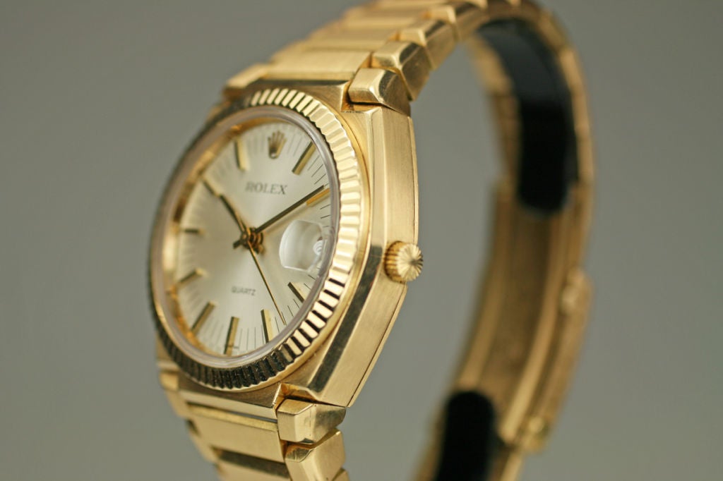 This is a limited edition Rolex Oyster Quartz watch in 18k yellow gold which was produced in the 1970s. This particular watch is an early version #112 out of approximately 1000 pieces made between yellow and white gold. The watch is in excellent
