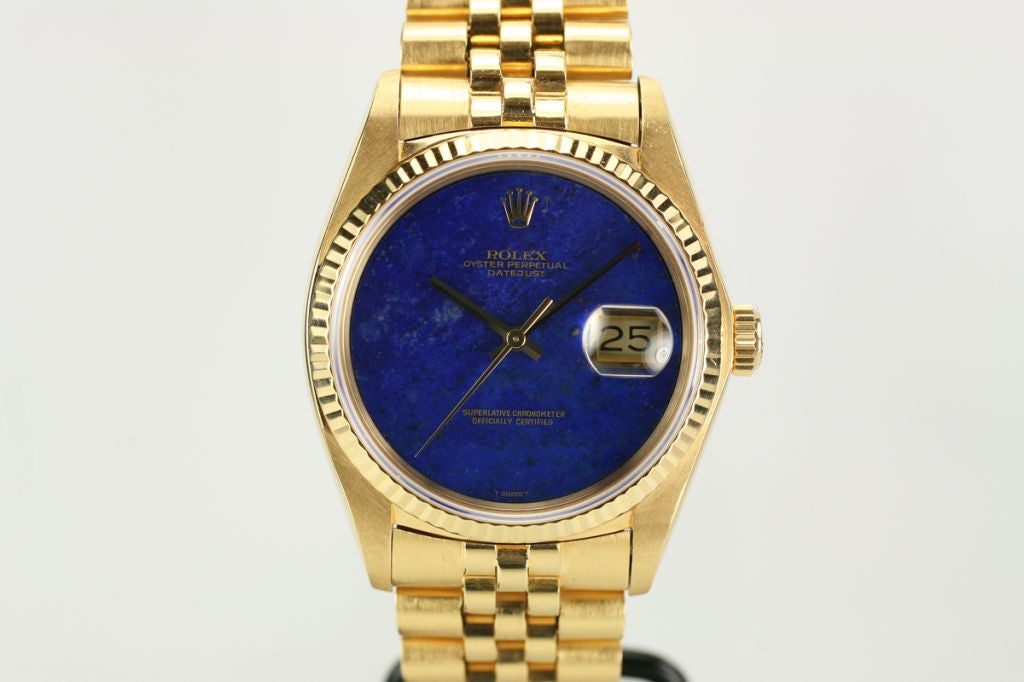 Rolex yellow gold Date Just with Lapis Lazuli dial, fluted bezel,with a automatic movement, and on a Rolex 18k yellow bracelet.