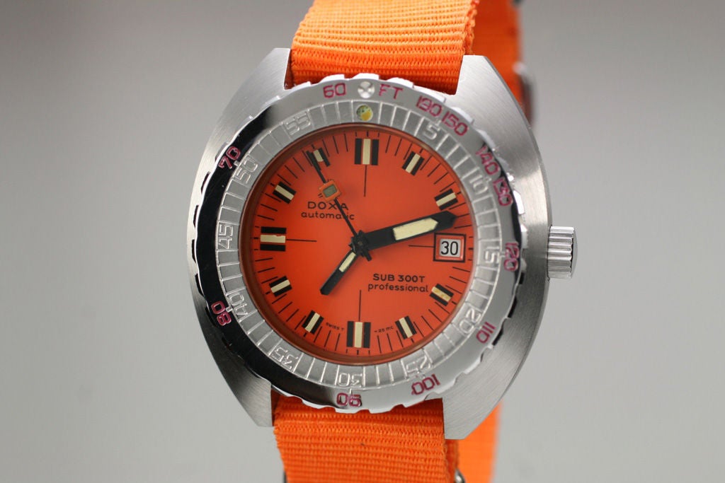 Vintage Doxa Sub 300T Professional with an original orange dial and highlighted by a modern nylon militay strap