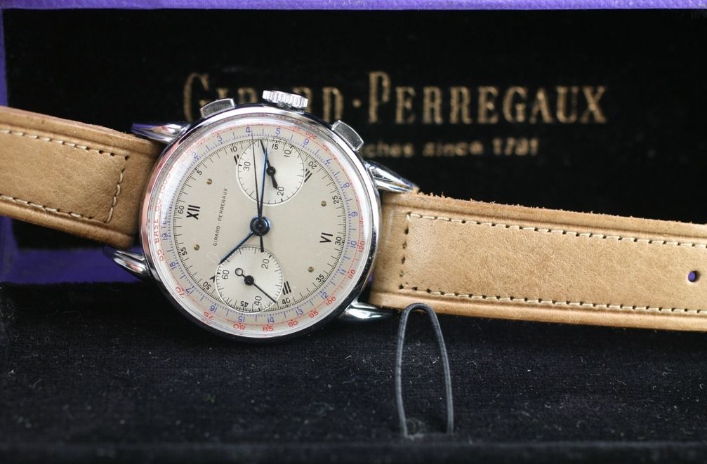 New old stock Girard-Perregaux two register chronograph. It features a beautiful three color dial. This is a truly rare watch in unbelievable condition with its original box and hang tag.