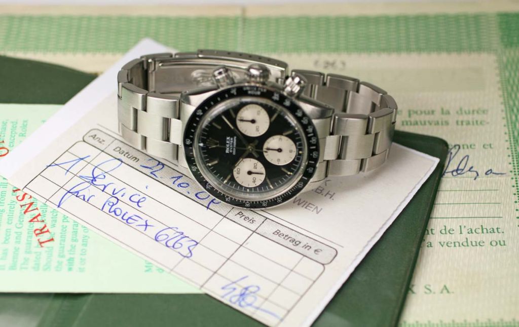 This is a beautiful Rolex Daytona from the early 1970s. It is a Reference 6263 and features a black bezel and screw down pushers. Not only is it in excellent condition but it also includes original paperwork. A true collectors dream.