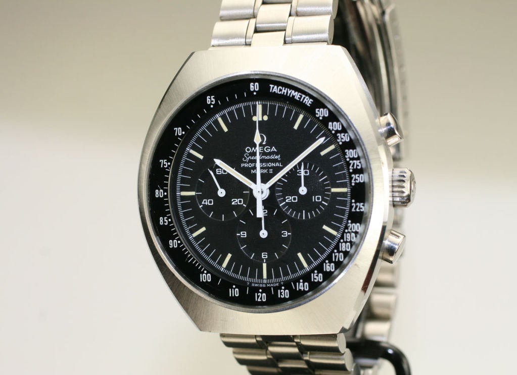 This is an exceptional example of an Omega Speedmasater Professional Mark II.  It is an unpolished watch with the original box and papers.  The original dial is in mint and untouched  condition.  It is very difficult to find this model in such