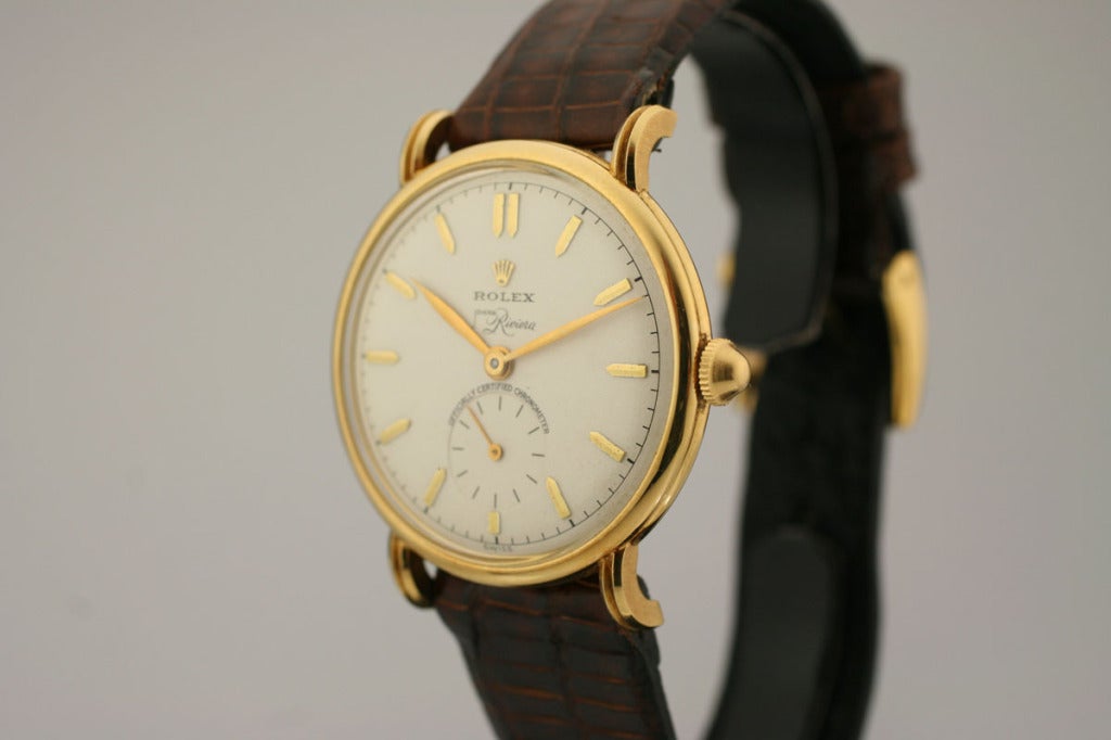 This is an incredible example of a Rolex precision from the 1950's. It is on 18k gold manual wind watch with beautiful double signed original dial by Joyeria Riviera. This was the official Rolex retailer in Puerto Rico. This double signature is very