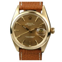 ROLEX Yellow Gold Oyster Perpetual Date Wristwatch