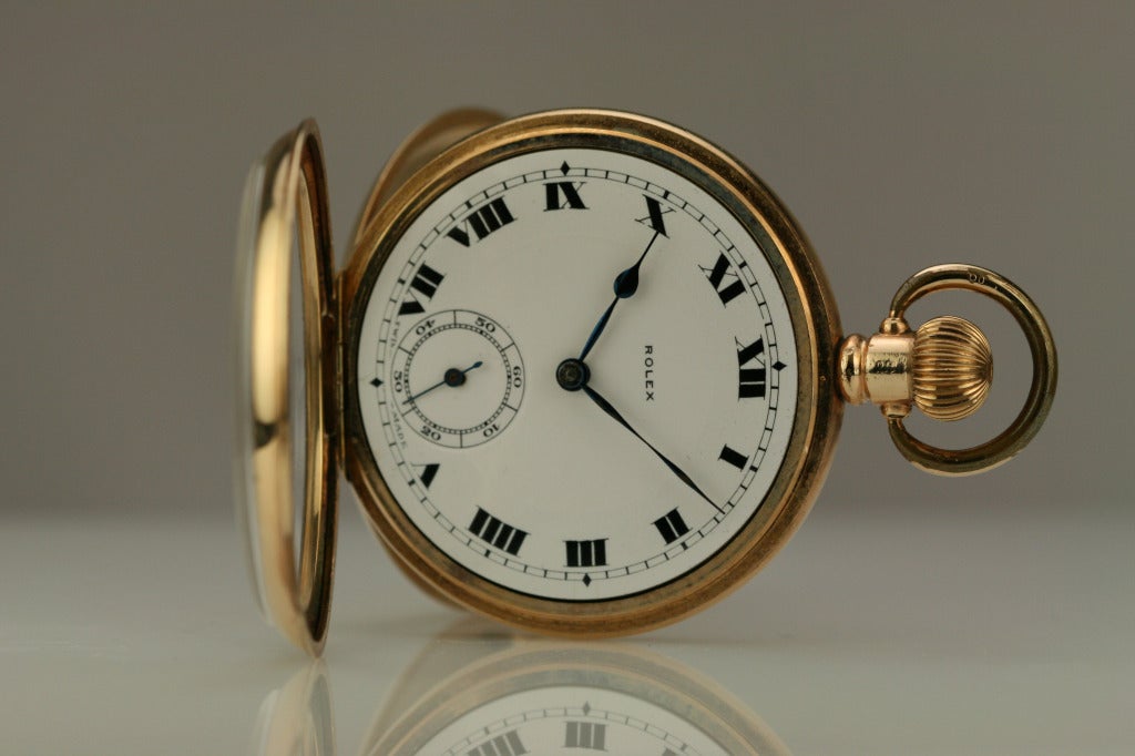 Rolex 10k yellow gold pocket watch from the 1940s with a hinged case.