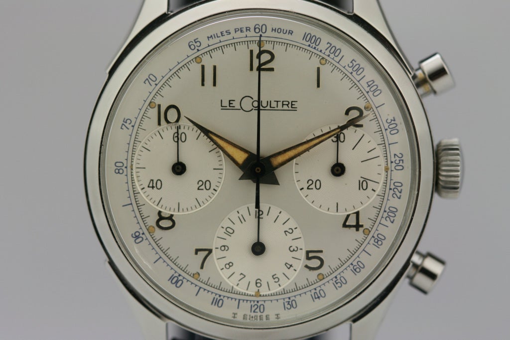 This is a near-mint example of a LeCoultre chronograph with a silvered dial, smooth bezel, and pump pushers.