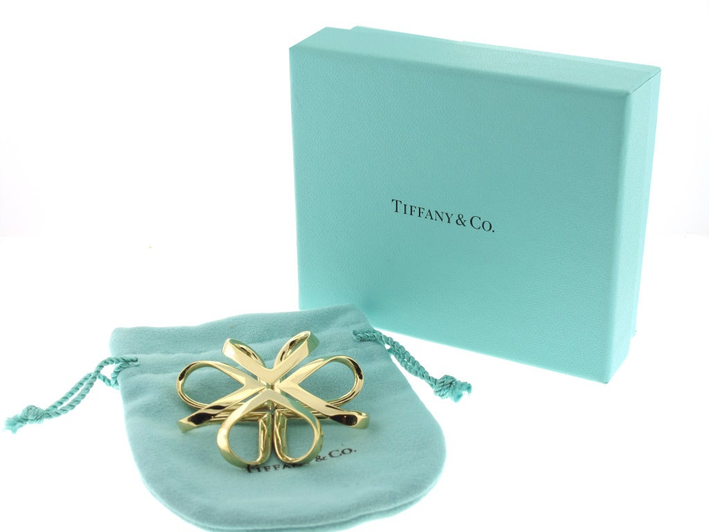 This Tiffany & Co. Yellow Gold Heart Brooch is 2 inches x 2 inches and weighs 32.7 grams.