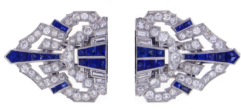 Platinum, sapphire and diamond Art Deco combination clips. The 1930s clips feature thirty-two sapphires that weigh 4 carats and ninety diamonds that have a total weight of 3.40 carats. Combination clips maybe combined as a brooch or separated and