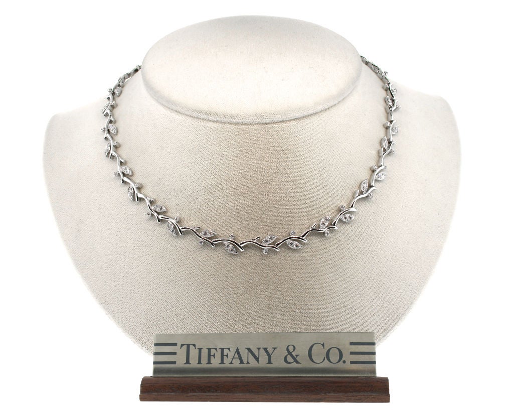 Classic pieces never go out of style.  This Tiffany & Co. platinum and diamond necklace is part of the Garland collection.  This necklace will add elegance and spunk to any outfit, casual or dressy.  Polished and restored to its original beauty,