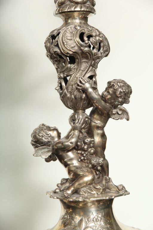 6 lights German silver candelabras with putti
