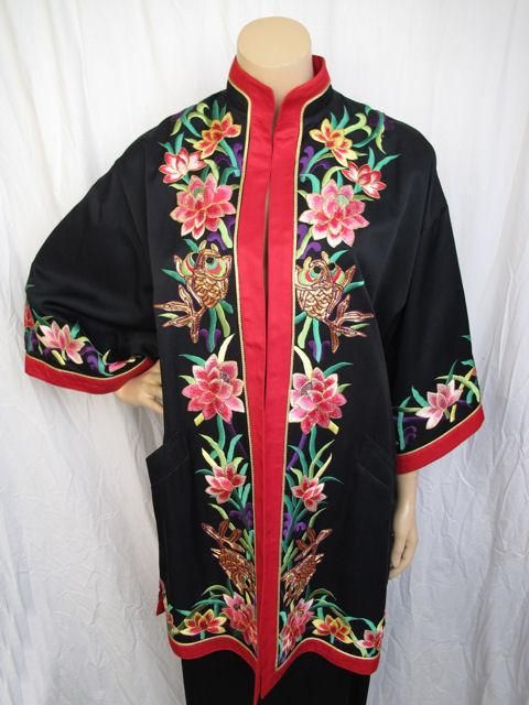 * The pictures really don't do this outfit justice.  The embroidery is so vibrant with gold threading throughout.
* The kimono styled jacket is open with full sleeves & two slant pockets.
* The skirt is faux wrap that closes in the back with a