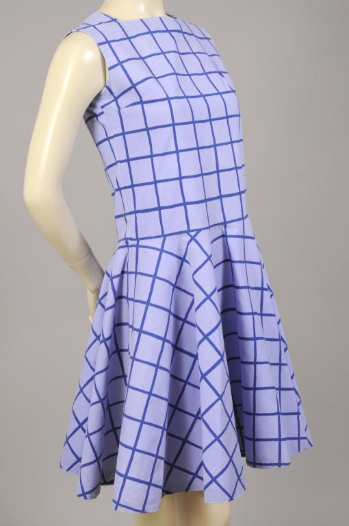 Short and sassy, this blue on blue dress sleeveless dress has a dropped waistline and a flirty skirt.  Imported by Design Research in 1965 this is one of the early and original Marimekko dresses.  It is just as stylish and wearable today as it was