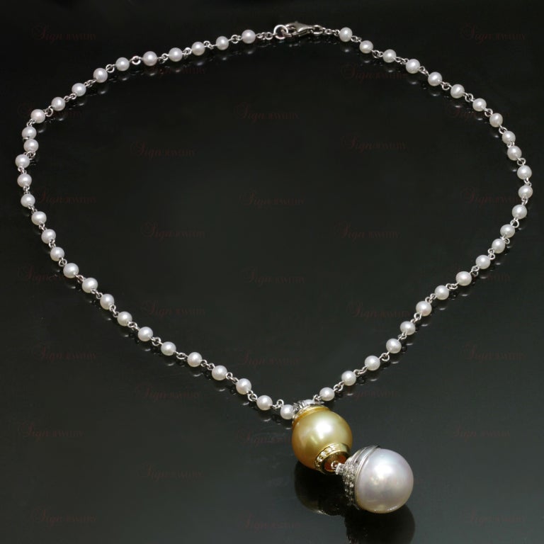 This new custom-made necklace features a stunning detachable enhancer with two 13.0mm - 14.0mm South Sea Cultured pearls encircled in 0.86 carats of sparkling round diamonds. The diamonds are pave-set in 18k yellow and white gold. The versatile and