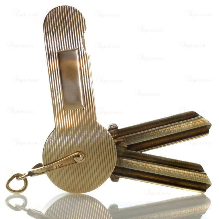 Tiffany & Co. Engravable Gold Steel Key Holder In Excellent Condition In New York, NY