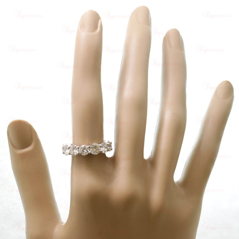 Brilliant Cut 6.45 Carat Diamond Shared-Setting Platinum Eternity Ring For Sale
