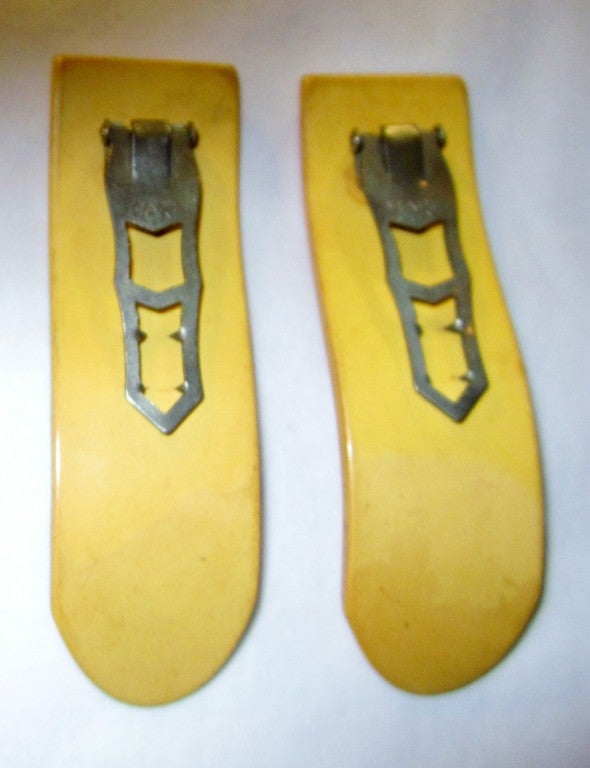 Excellent Pair of Carved Butterscotch Bakelite Dress Clips