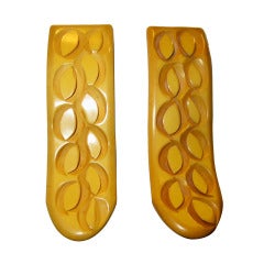 Excellent Pair of Carved Butterscotch Bakelite Dress Clips
