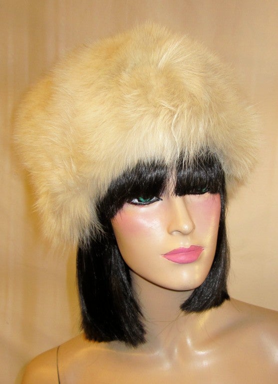 This is a gorgeous, stunning, and full white fox fur hat from the 1960's vintage.  The crown of the hat measures 6.5