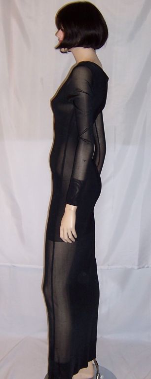 This is lovely, sleek and sensual long black gown by Mariot Chanet, the husband and wife design team in Paris, who had produced this piece 1994/1995. The design team had worked for either, separately or collectively, Alaia, Karl Lagerfeld, Thierry