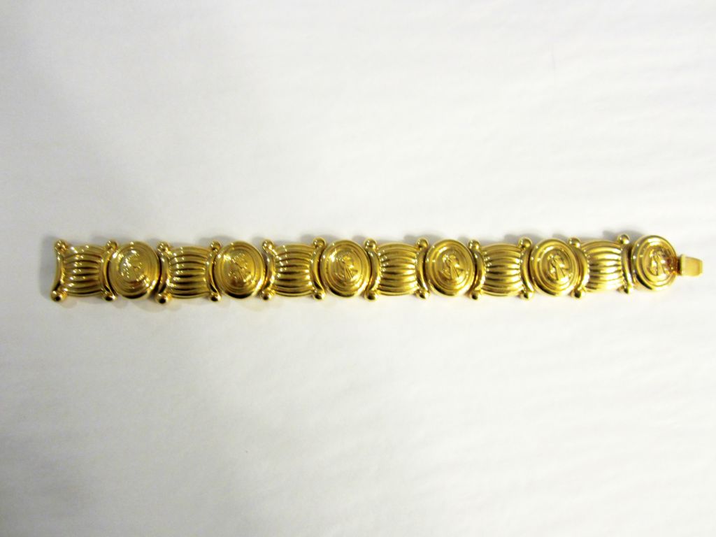 Exquisite Egyptian Revival Gold-Toned Bracelet with Medallions