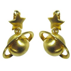 Unique Gold-Toned Earrings with Saturn Hanging from a Star