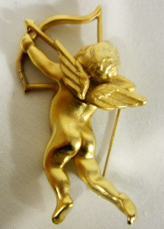 This is a charming figural Cupid, Roman god of Love, brooch in excellent vintage condition and beautifully constructed. It measures approximately 1 1/2