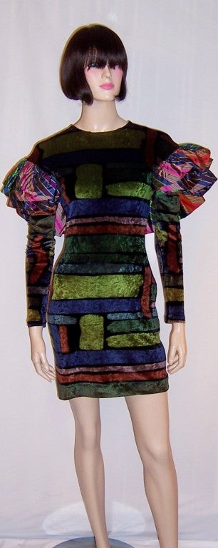 This is a wonderful Christian Lacroix late 1980's creation which clearly exmplifies all of his design sensibilities including his confidently mixing offbeat combinations of overpowering colors and prints, his use of luminous colors, and his use of