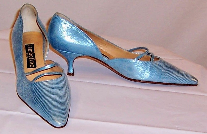 This is a gorgeous pair of Ombeline-Paris, powder blue metallic pumps with pointed toes and a 2 1/2