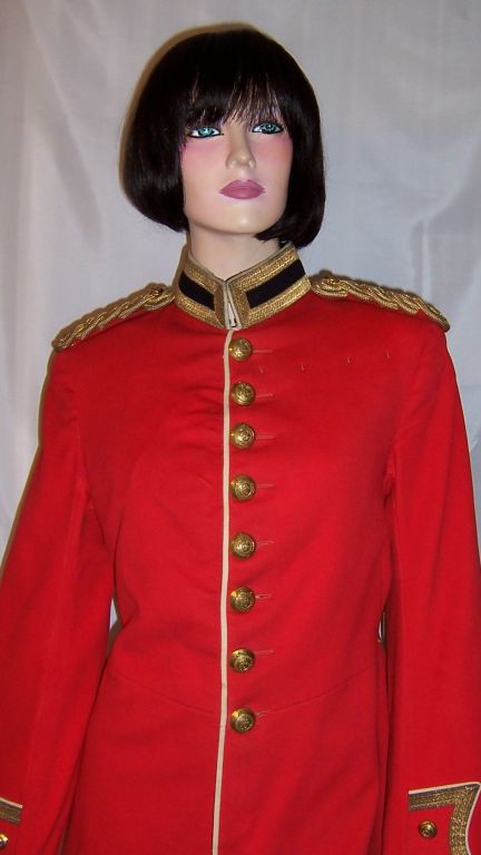 This is a handsome, Victorian Era (1837-1901) red, British Militia uniform probably made for a very young man. It is in exceptionally good condition for its age. All of the very detailed metal buttons are present and accounted for including the