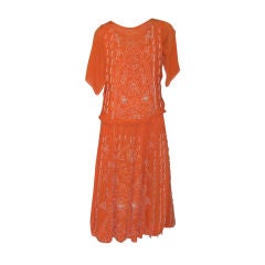 Early 1920's Vivid Orange Gown with White Beadwork Designs