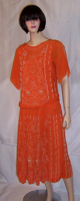 Early 1920's Vivid Orange Gown with White Beadwork Designs
