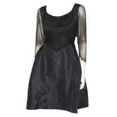 Vintage Chic 
Flirty 1950
s Black Cocktail Dress with Illusion Sleeves