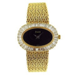 Piaget, Gold Ladies Bracelet Watch W/Onyx Dial & Diamonds