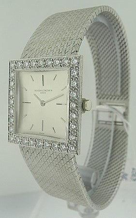 This is a Vacheron Constantin, 18k white gold square with diamond bezel lady's bracelet wristwatch, ref 7880. Comes with 18k white gold integrated VC bracelet (7 3/4 inches). Manufactured in circa 1970'. Square bezel in 26x26mm. Dial, case and