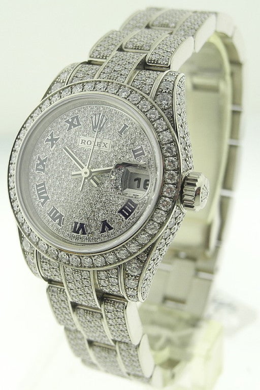 Oyster Perpetual Lady's 18k White Gold and Pavé-Set Diamond Datejust, Ref: 179459, case no. K575199, Ref:80299, Case No. Z457479,
31-jewel Cal. 2235 movement adjusted to temperature and position, circular pave-set diamond dial with blue roman