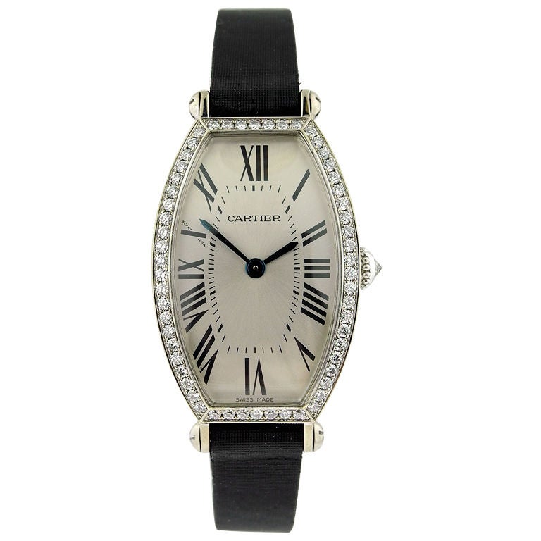 Cartier Lady's Tonneau "Mecanique" Watch With Diamond Bezel For Sale