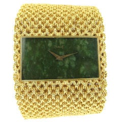 Piaget Ladies Yellow Gold Wide Bracelet Watch with Jade Dial