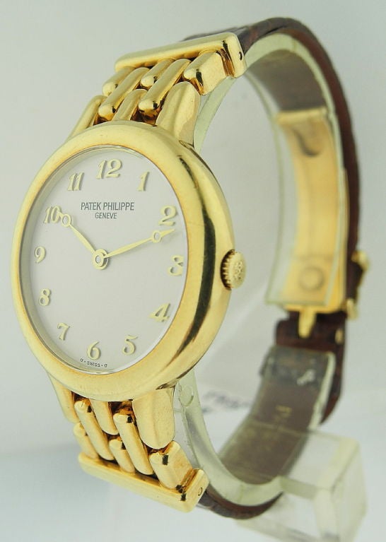 PATEK PHILIPPE Gold Ladies/Flexible Link Lugs Wristwatch Ref. 4812 Movement No. 1618212