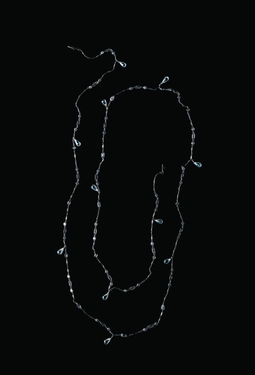 *Please contact us for more information on this piece or on creating your own Alexandra Mor custom Design. 

An Alexandra Mor necklace with 56 Ideally cut fancy shape diamonds set in platinum bezel set diamond sautoir, totaling approximately 13