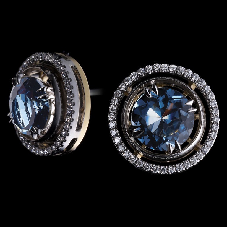 *Please contact us for more information on this piece or on creating your own Alexandra Mor custom Design. 

A pair of Alexandra Mor earrings featuring a 4.39 carats London Blue Topaz accompanied by round Diamond earring jackets detailed with