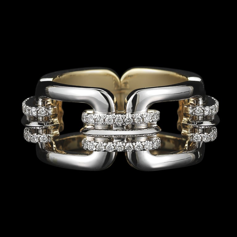 *Please contact us for more information on this piece or on creating your own Alexandra Mor custom Design. 

An Alexandra Mor flexible, chain-link ring with four rectangular 18 karat white gold and 18 karat yellow gold links connected by Alexandra