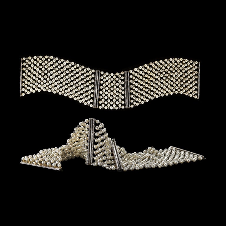 *Please contact us for more information on this piece or on creating your own Alexandra Mor custom Design. 

A pair of Alexandra Mor Pearl-mesh and Diamond cuff bracelets set in 18 karat white gold detailed with Alexandra Mor's signature knife-edged