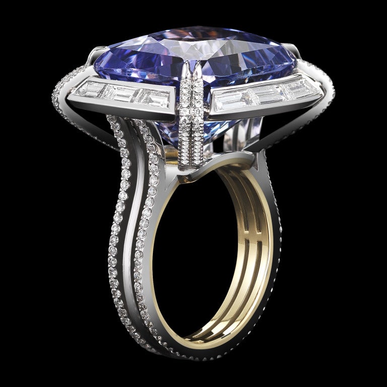 *Please contact us for more information on this piece or on creating your own Alexandra Mor custom Design. 

An Alexandra Mor one-of-a-kind 25.78 carat cushion-cut Lilac Tanzanite ring set with Alexandra Mor signature details of 1mm floating diamond