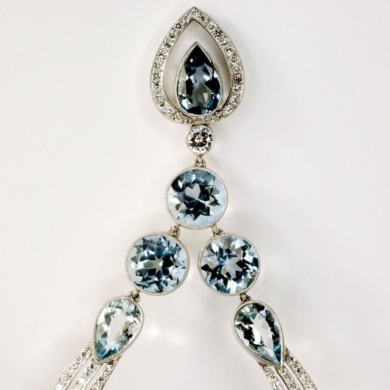 Staggering diamond and aquamarine chandelier earrings.  These earrings drop 5