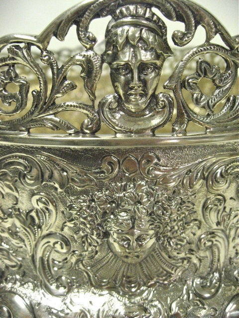 Antique English, Victorian, Sterling Silver 2 Handled Bowl. The Entire Body Is Beautifully Hand Chased With The Exception Of A Blank Cartouche On One Side. The Round Pedestal Foot Is Hand Chased To Match, And The Cast Scroll Handles Are Topped By A