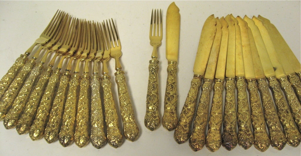 ASPREY Magnificent Sterling Silver Gilt Complete Vine Pattern Flatware Service
A Rare To Find, Complete Sterling Silver Gilt, Asprey Flatware Service For 12 People. Complete With 12 Of Each Of The Following: Table Knives, Table Forks, Soup Spoons,