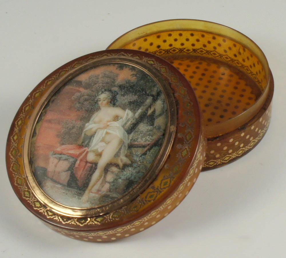One of the finest old Napoleonic era to Louis Philippe 'naughty' or highly sensual themed miniature painting-beset tortoise shell snuff boxes.  The snuff box is adorned with hundreds of 18k gold stars and other pique inlays, making this more like a