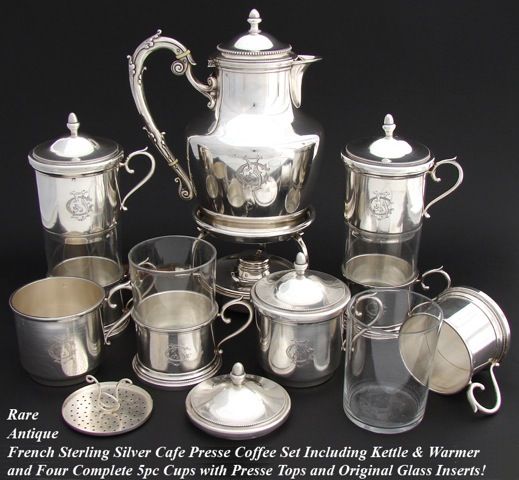 Magnificent & RARE antique French Belle Epoque era sterling silver cafe press ensemble, a rare collection of thirty-one separate pieces culminating in a hot water pot or kettle, raised warmer base and four complete 5pc brewing cups (sometimes called